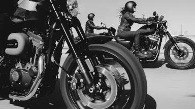 Three Harley Davidson motorcycles on the highway