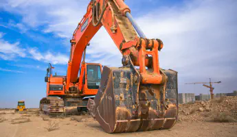 Transport an excavator safely