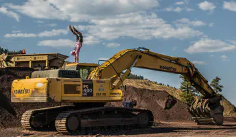 Moving large machinery with specialized heavy-haul trailers and rigging equipment